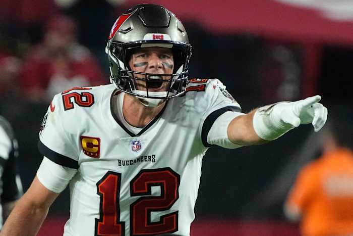 Buccaneers QB Tom Brady calls a play at the line of scrimmage